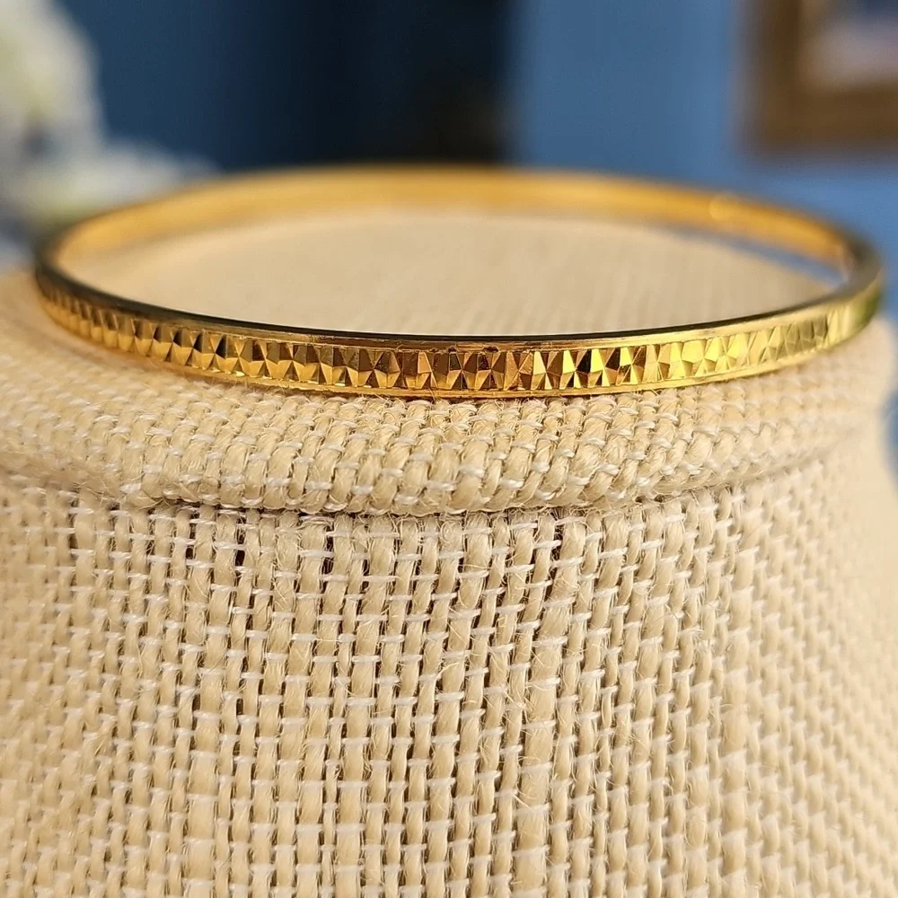 Trifari Elegant Gold Tone Bangle Bracelet